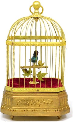 Lot 521 - A Singing Bird in a Cage Automaton, 20th century, domed gilt metal bird cage, single bird with...