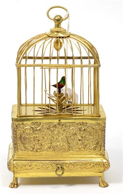 Lot 522 - A Singing Bird in a Cage Automaton, 20th century, domed gilt metal bird cage, single bird with...