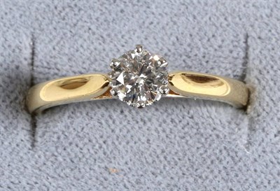 Lot 583 - An 18 Carat Gold Solitaire Diamond Ring, a round brilliant cut diamond in a claw setting, to...