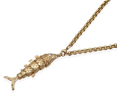 Lot 589 - A 9 Carat Gold Articulated Fish Pendant, on Chain, with round brilliant cut diamond set eyes,...