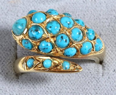 Lot 595 - An 18 Carat Gold Turquoise Snake Ring, inset with round and pear cabochon turquoise, to a snake...