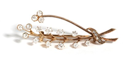 Lot 605 - A Diamond Spray Brooch, old cut diamonds in claw settings, to knife edge bar 'stems' and a...