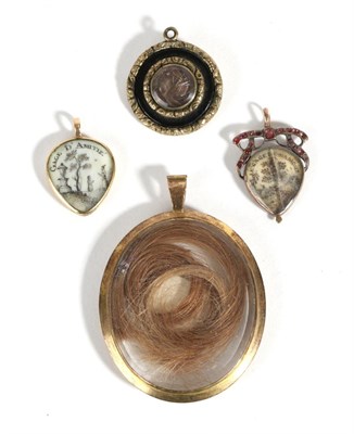 Lot 633 - A Georgian Mourning Pendant, a glazed pear-shaped plaque painted depicting a lady and child in...