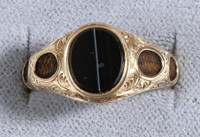 Lot 635 - A Victorian Banded Agate and Hairwork Mourning Ring, an oval banded agate plaque in a rubbed...