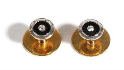 Lot 646 - A Cased Pair of Onyx and Diamond Studs, an old cut diamond in a milgrain setting to an onyx...