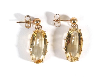 Lot 647 - A Pair of Citrine Drop Earrings, oval cut citrine in claw settings suspended from ball studs,...