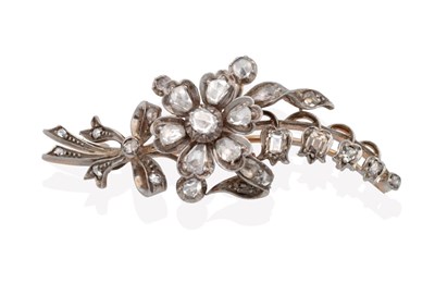 Lot 652 - A Diamond Spray Brooch, a flower head with a central rose cut diamond and pear rose cut diamond...