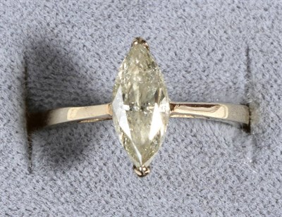 Lot 653 - A Marquise Cut Solitaire Diamond Ring, in a claw setting, to knife edge shoulders, estimated...