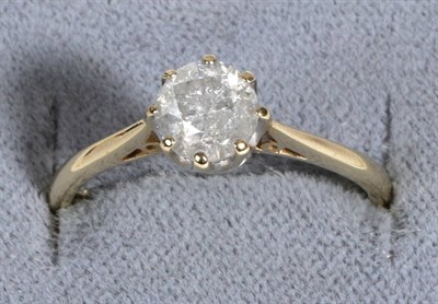 Lot 671 - A 9 Carat Gold Solitaire Diamond Ring, a round brilliant cut diamond in a claw setting, to...