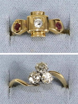 Lot 685 - A Diamond Three Stone Ring, old cut diamond in claw settings as a clover arrangement, to knife edge