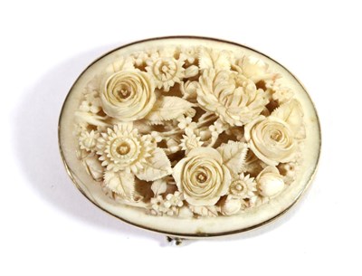 Lot 690 - A Dieppe Ivory Floral Brooch, Circa 1880, an oval plaque carved in high relief depicting roses,...