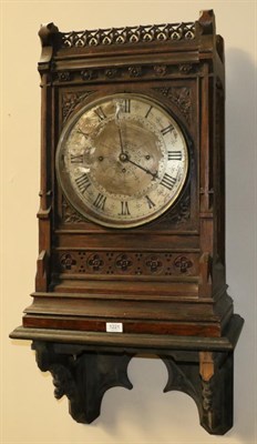 Lot 1221 - A Large Gothic Style Carved Oak Chiming Bracket Clock, circa 1870, pediment with a pierced gallery