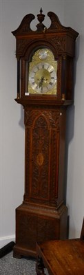 Lot 1222 - An Oak Eight Day Longcase Clock, elaborately later carved case with a swan neck pediment,...