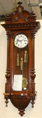 Lot 1228 - A Vienna Type Quarter Striking Wall Clock, circa 1890, arched pediment, glazed trunk door and...