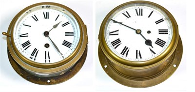 Lot 1240 - Two Brass Cased Ship's Bulk Head Timepieces, late 19th/early 20th century, the first, brass...