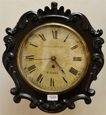 Lot 1243 - A Mahogany Wall Timepiece, signed Charles Nephew & Co, Calcutta, circa 1870, carved scroll and leaf