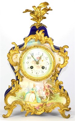 Lot 1269 - A Ceramic and Gilt Metal Mounted Striking Mantel Clock, early 20th century, ceramic case with...