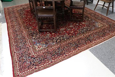 Lot 1287 - Kashan Carpet of Unusual Size Central Persia, circa 1950 The crimson field of scrolling vines...