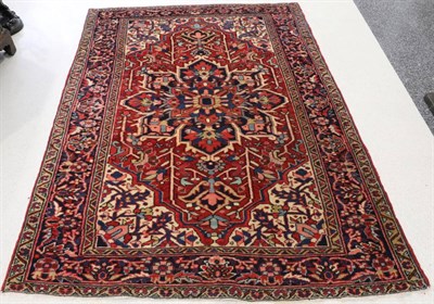 Lot 1321 - Heriz Rug of Unusual Size Iranian Azerbaijan, circa 1930 The strawberry field of angular vines...