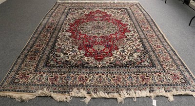 Lot 1331 - Nain Carpet Central Iran, circa 1960 The crimson field of palmettes and scrolling vines centred...