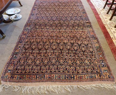 Lot 1332 - Afshar Rug South East Iran, circa 1940 The indigo field with column of stylised plants enclosed...