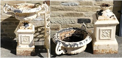 Lot 1362 - A Pair of Victorian Cream Painted Cast Iron Garden Urns, late 19th century, of campana shaped...