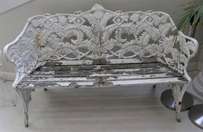 Lot 1369 - A Coalbrookdale Style White Painted Cast Iron Garden Bench, the back cast with ferns over a...