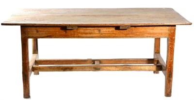 Lot 1384 - An 18th Century Rustic Elm and Pine Dining Table, with single frieze drawer above a plain...