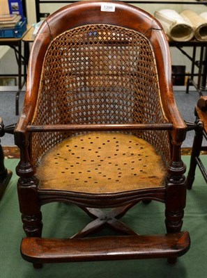 Lot 1398 - A Late 19th Century Child's Beech Framed Bergère High Chair, with curved back support and vasiform