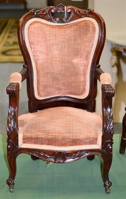 Lot 1400 - A Victorian Child's Carved Mahogany Fauteuil, circa 1870, upholstered in pink velvet, with an...