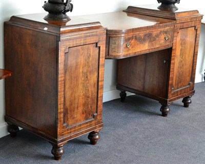 Lot 1442 - A Regency Mahogany and Brass Strung Pedestal Sideboard, early 19th century, of bowfront form with a