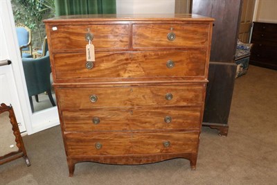 Lot 1447 - A George III Mahogany Chest on Chest, early 19th century, the upper section with two short over one