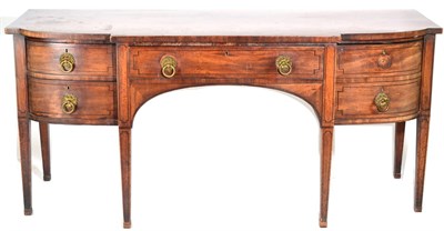 Lot 1461 - A Regency Mahogany and Ebony Strung Sideboard, early 19th century, of breakfront form with...