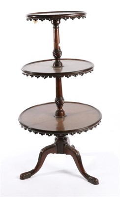 Lot 1471 - A George III Mahogany Three-Tier Circular Dumb Waiter, early 19th century, of graduated form...