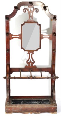 Lot 1482 - A Victorian Mahogany Hall Stand, circa 1870, with central mirror plate and moulded frame flanked by