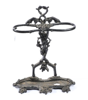 Lot 1492 - A Victorian Black Cast Iron Stick Stand, late 19th century, decorated with vines with a...