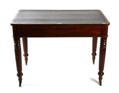 Lot 1501 - An Early 19th Century Mahogany Writing Table, of rounded rectangular form with inset black...