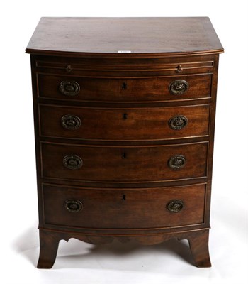 Lot 1503 - A George III Style Mahogany and Crossbanded Bowfront Chest of Drawers, with pull-out brushing slide