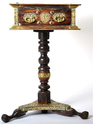 Lot 1508 - A 19th Century Indian Hardwood and Brass Mounted Pedestal Table, with engraved foliate...