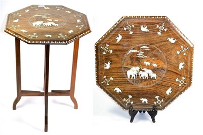 Lot 1510 - An Early 20th Century Indian Rosewood Octagonal Shaped Folding Table, the top inlaid with ivory...