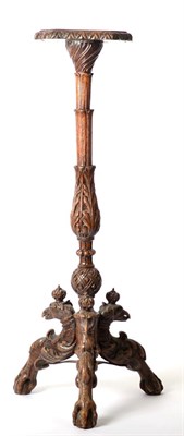 Lot 1514 - A 19th Century Continental Carved Oak Torchere, with octagonal shaped platform top, raised on...