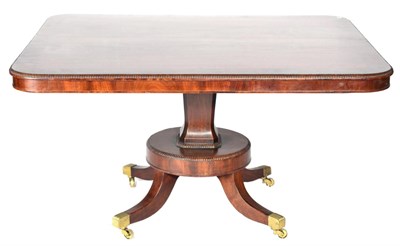 Lot 1521 - A Regency Mahogany and Ebony Strung Breakfast Table, early 19th century, of rounded rectangular...