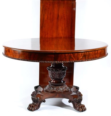 Lot 1523 - A William IV Circular Mahogany Extending Dining Table, circa 1840, with one additional leaf and...