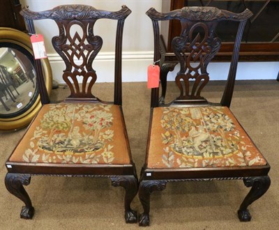 Lot 1529 - A Matched Pair of George III Mahogany Dining Chairs, late 18th century, with acanthus carved...