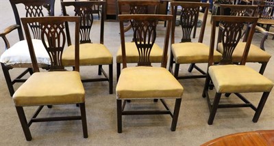 Lot 1531 - A Set of Eight George III Mahogany Dining Chairs, early 19th century, including two carvers...