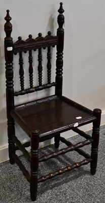 Lot 1532 - An Elm Spindle Back Chair, probably American, later painted and dated 1853, with turned finials...