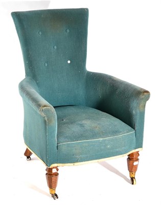 Lot 1545 - A Victorian Oak Framed Armchair, recovered in green buttoned fabric with rounded arms and...