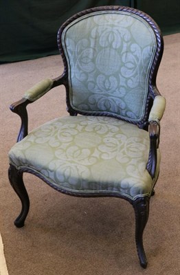 Lot 1549 - A 19th Century Carved Mahogany Hepplewhite Style Fauteuil, recovered in green floral fabric...