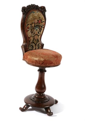 Lot 1551 - A William IV Rosewood Cello Seat, 2nd quarter 19th century, with floral needlework back support and