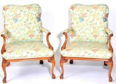 Lot 1553 - A Pair of Gainsborough Style Library Armchairs, of recent date, upholstered in green and floral...